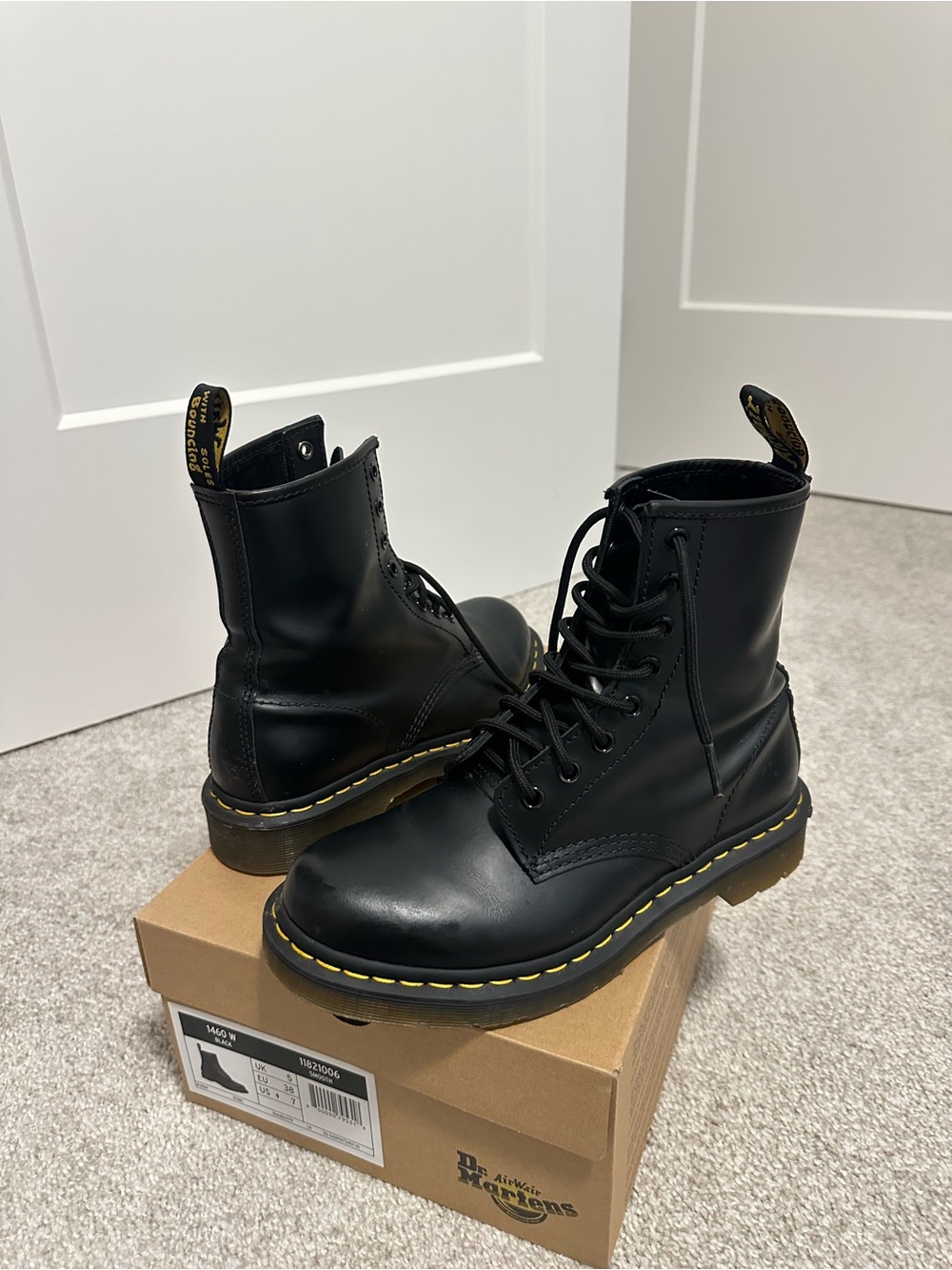 Dr. Martens Black Leather Boots with Yellow Stitching